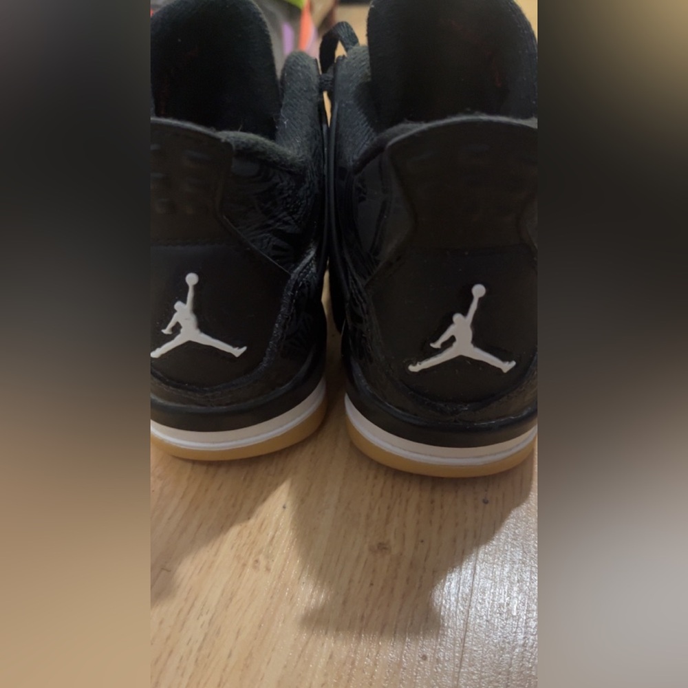 Laser black gum (GS) Jordan 4’s